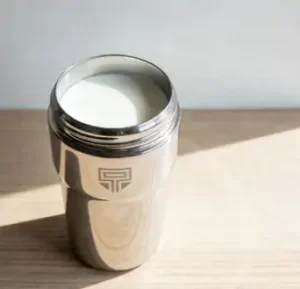 vacuum flask with cold milk